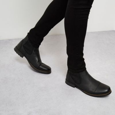 Black leather distressed Chelsea boots